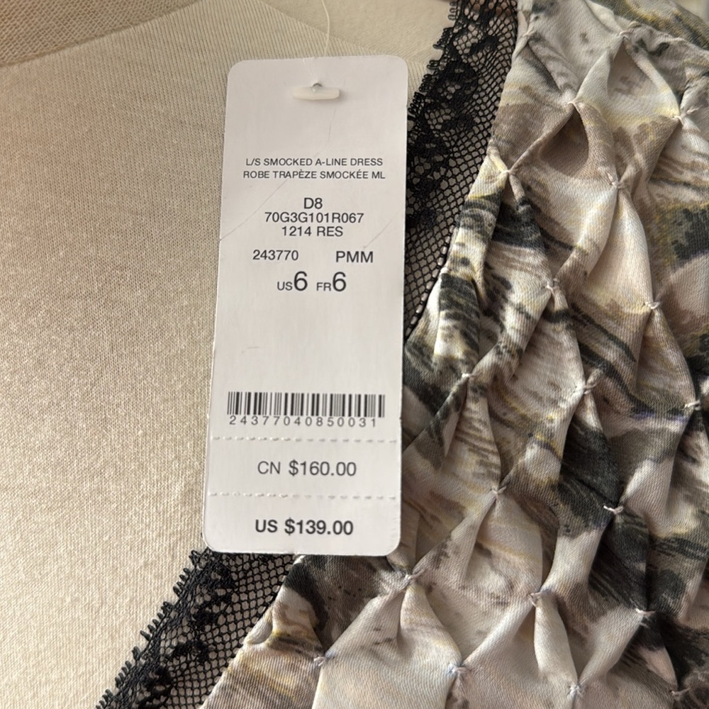 BEBE Dress with plenty smocking on shoulders , sleeves and yoke of the skirt. - Picture 7 of 9